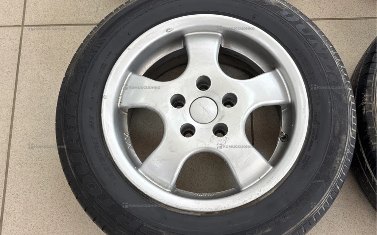 Диски с резиной Dunlop 195/65 R15 Passat B5 5x112