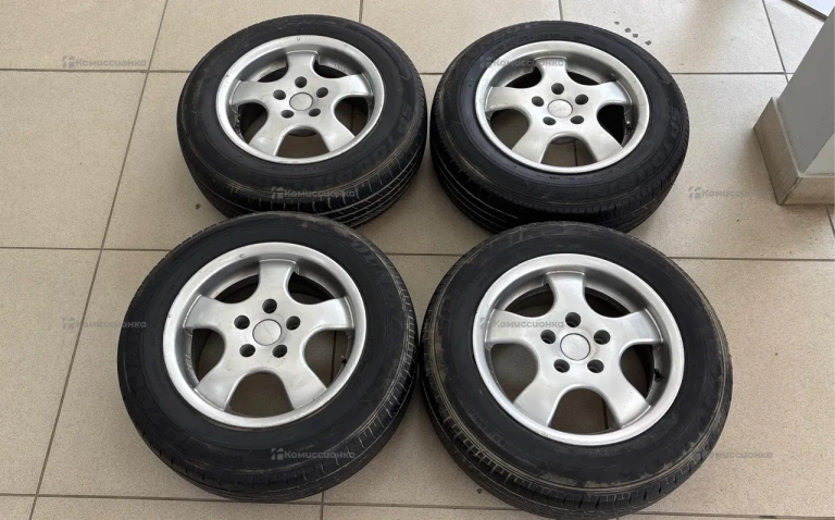 Диски с резиной Dunlop 195/65 R15 Passat B5 5x112